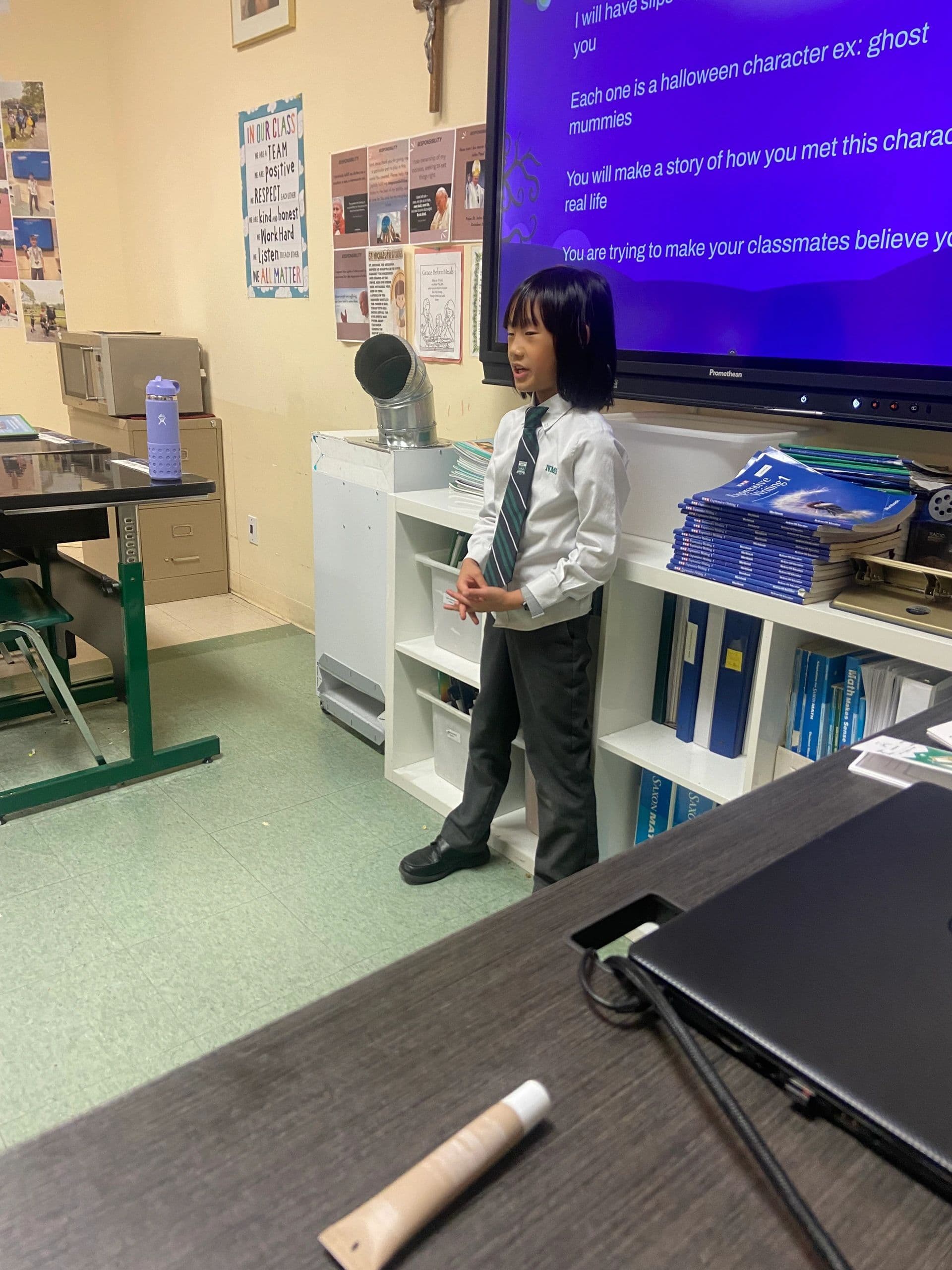 A Young Voices student presenting to the group.